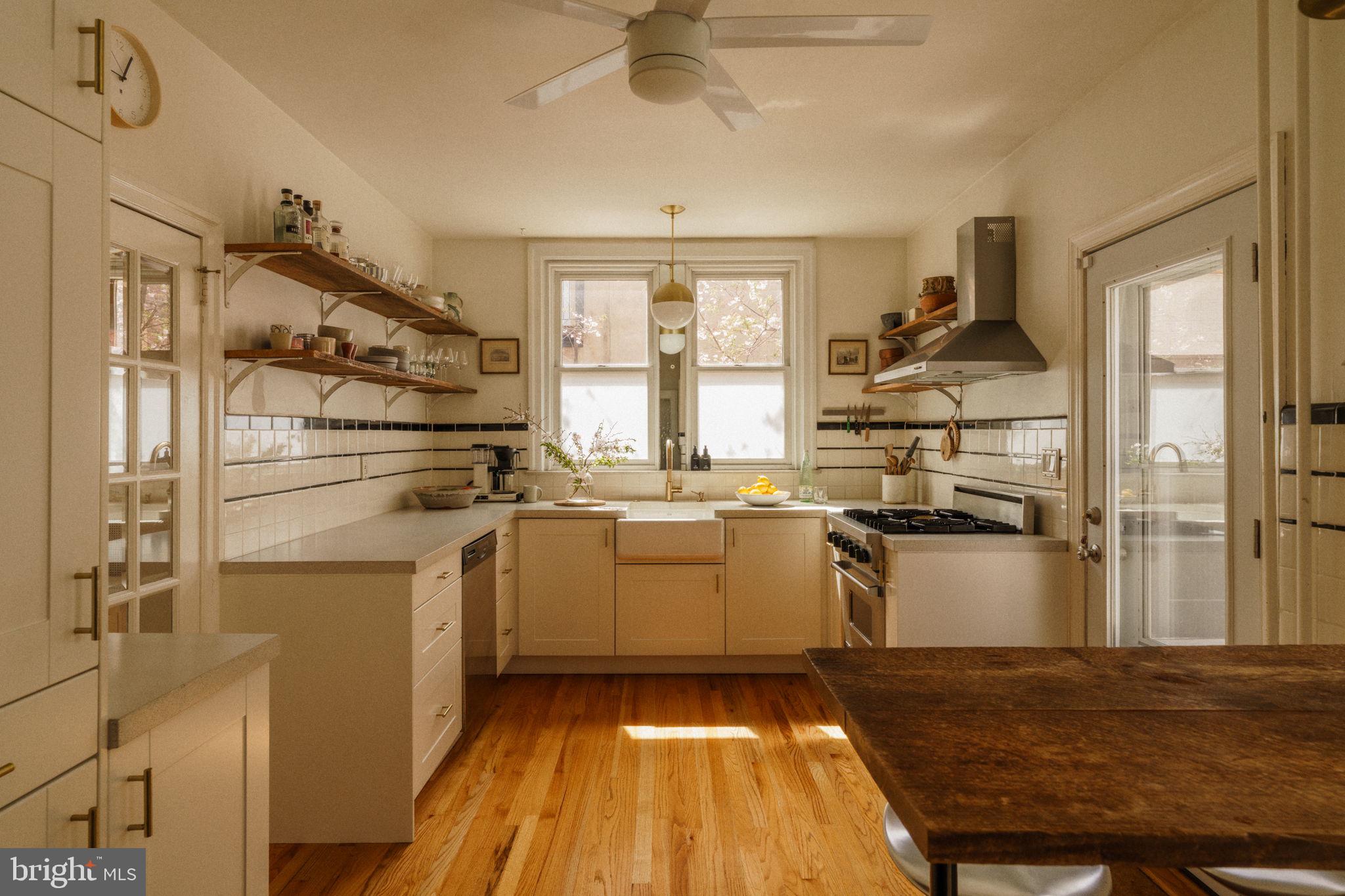 1828 South 9th Street Philadelphia, PA 19148 - Photo 16 of 83 a kitchen with a sink appliances and cabinets