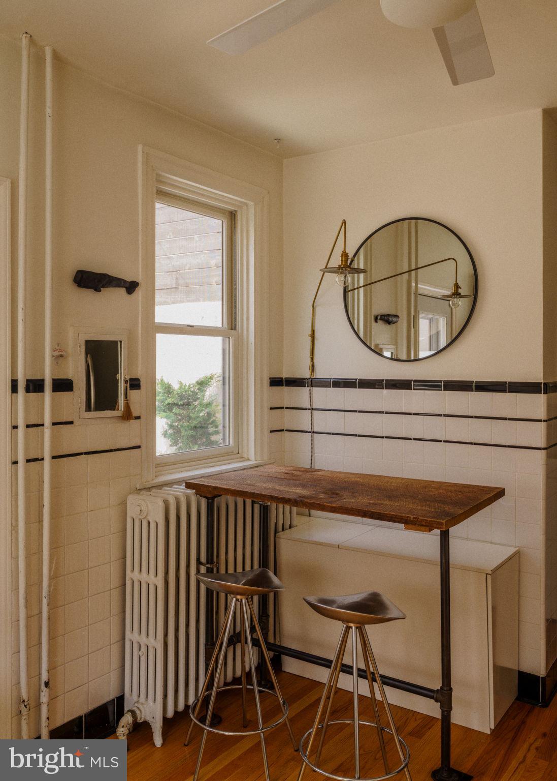 1828 South 9th Street Philadelphia, PA 19148 - Photo 25 of 83 a view of a chair and table in a balcony