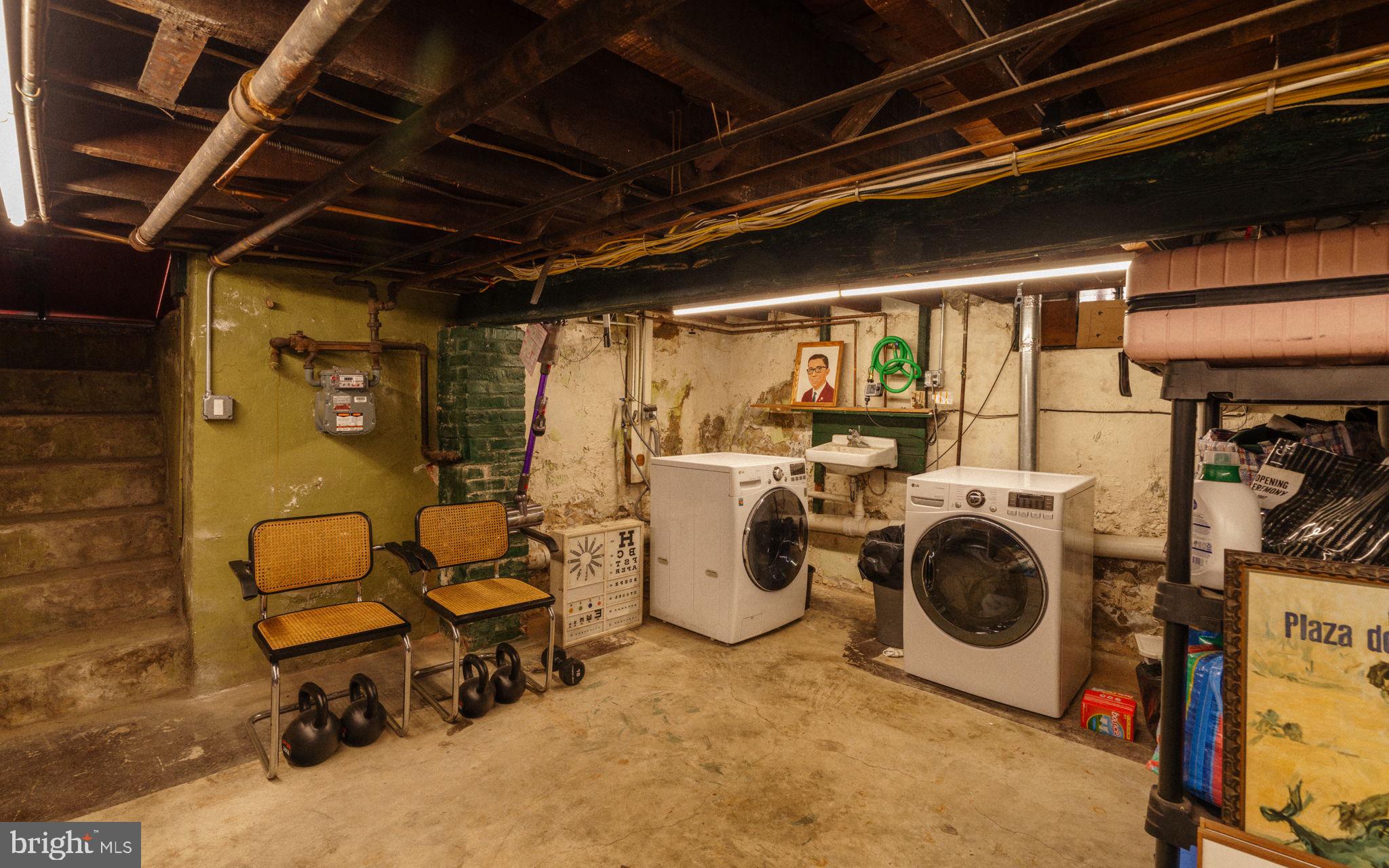 1828 South 9th Street Philadelphia, PA 19148 - Photo 28 of 83 a view of a storage & utility room with washer and dryer