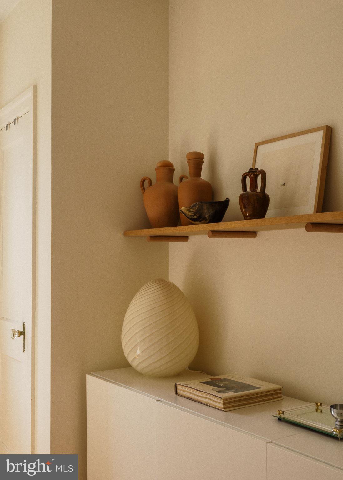 1828 South 9th Street Philadelphia, PA 19148 - Photo 41 of 83 a room with a table and chair