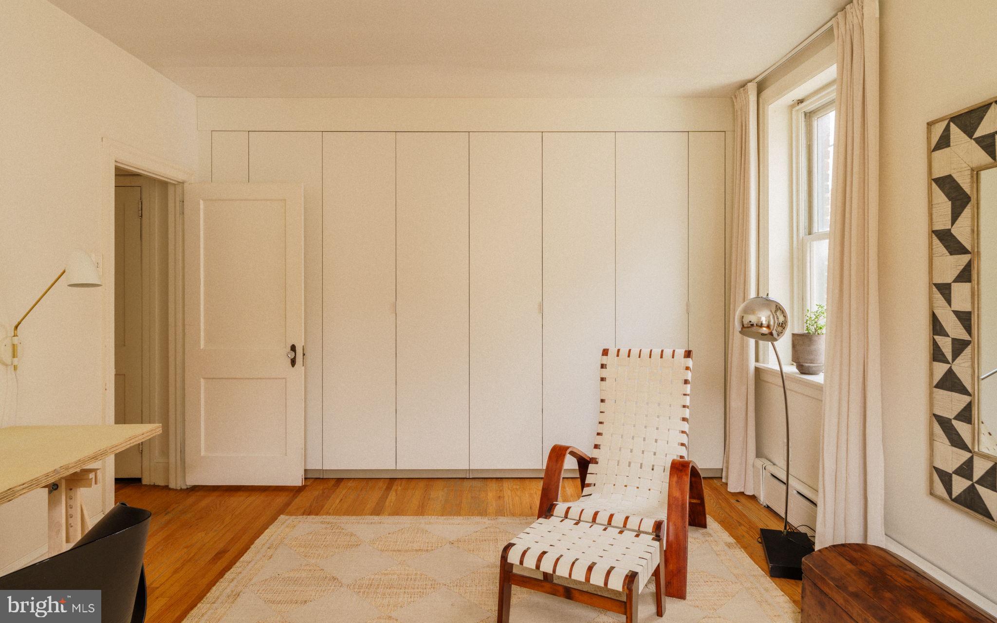 1828 South 9th Street Philadelphia, PA 19148 - Photo 49 of 83 a view of a bedroom with furniture and the window