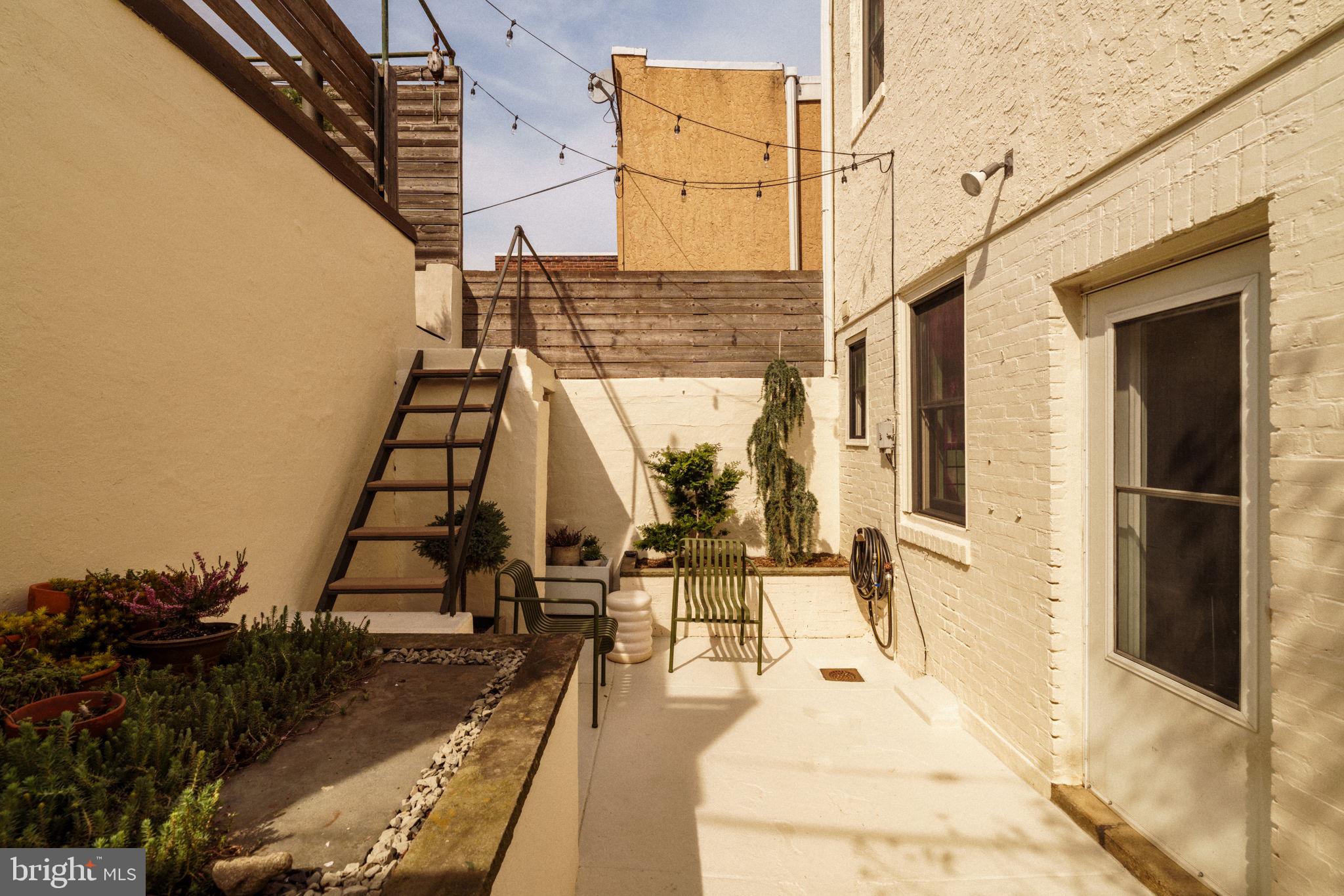 1828 South 9th Street Philadelphia, PA 19148 - Photo 50 of 83 a view of a balcony with wooden floor and outdoor seating