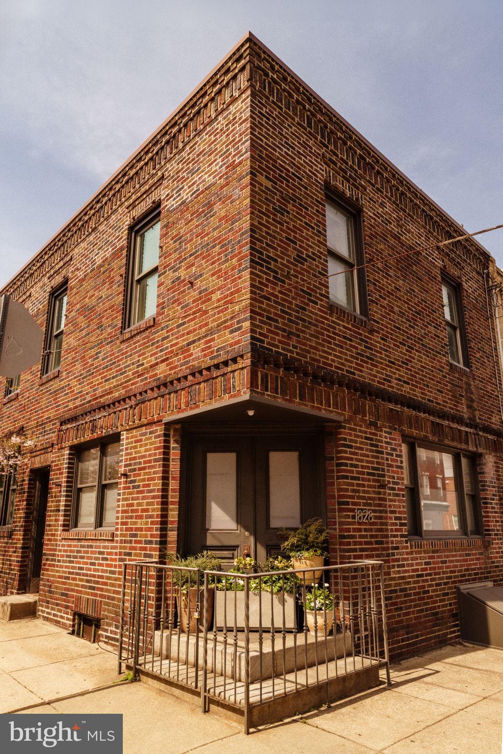 1828 South 9th Street Philadelphia, PA 19148 - Photo 70 of 83 a front view of a house with glass windows