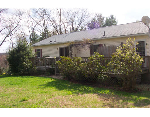 528 Cronin Road Warren, MA 01585 - Photo 3 of 13 a view of a back yard of the house