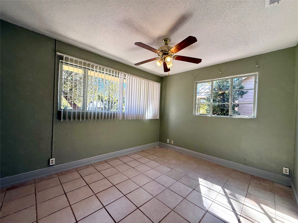 3702 Werner Avenue Austin, TX 78722 - Photo 11 of 20 a view of an empty room with a window