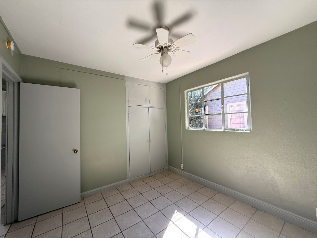 3702 Werner Avenue Austin, TX 78722 - Photo 15 of 20 wooden floor in an empty room with a window