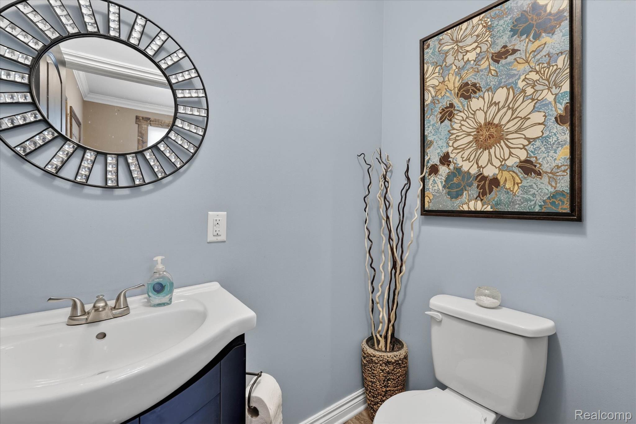 9074 Ridgefield Drive Brighton, MI 48114 - Photo 47 of 75 Bathroom featuring vanity and crown molding