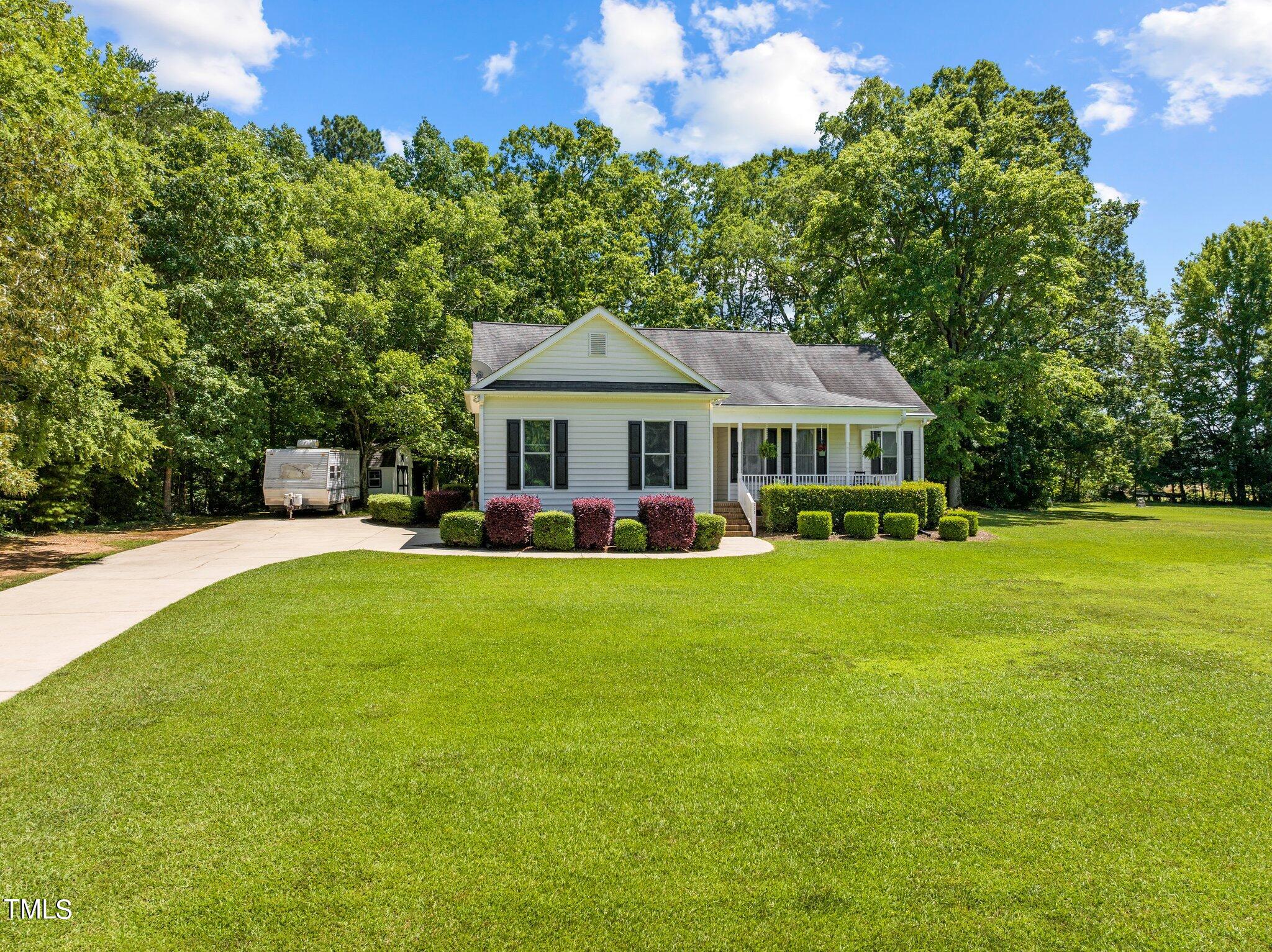 111 Fletcher Ridge Road Timberlake, NC 27583 - Photo 3 of 46 45-web-or-mls-DJI_20240607143729_0613_D