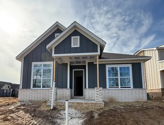 a picture of a bench in front of a door