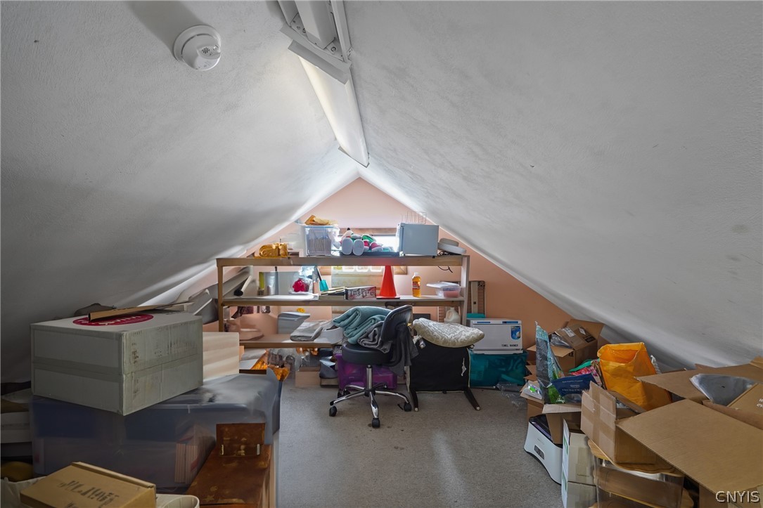 2 Mechanic Street Lysander, NY 13027 - Photo 20 of 28 The finished attic storage room with sloped ceilin