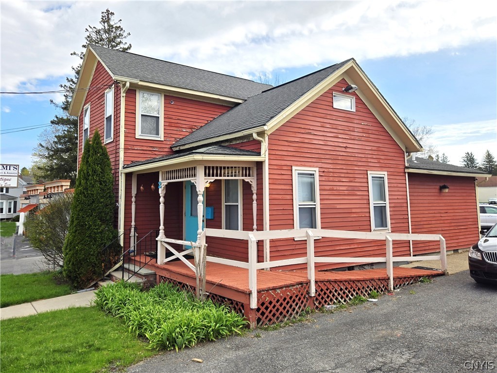2 Mechanic Street Lysander, NY 13027 - Photo 2 of 28 The attractive covered front porch welcomes you, b