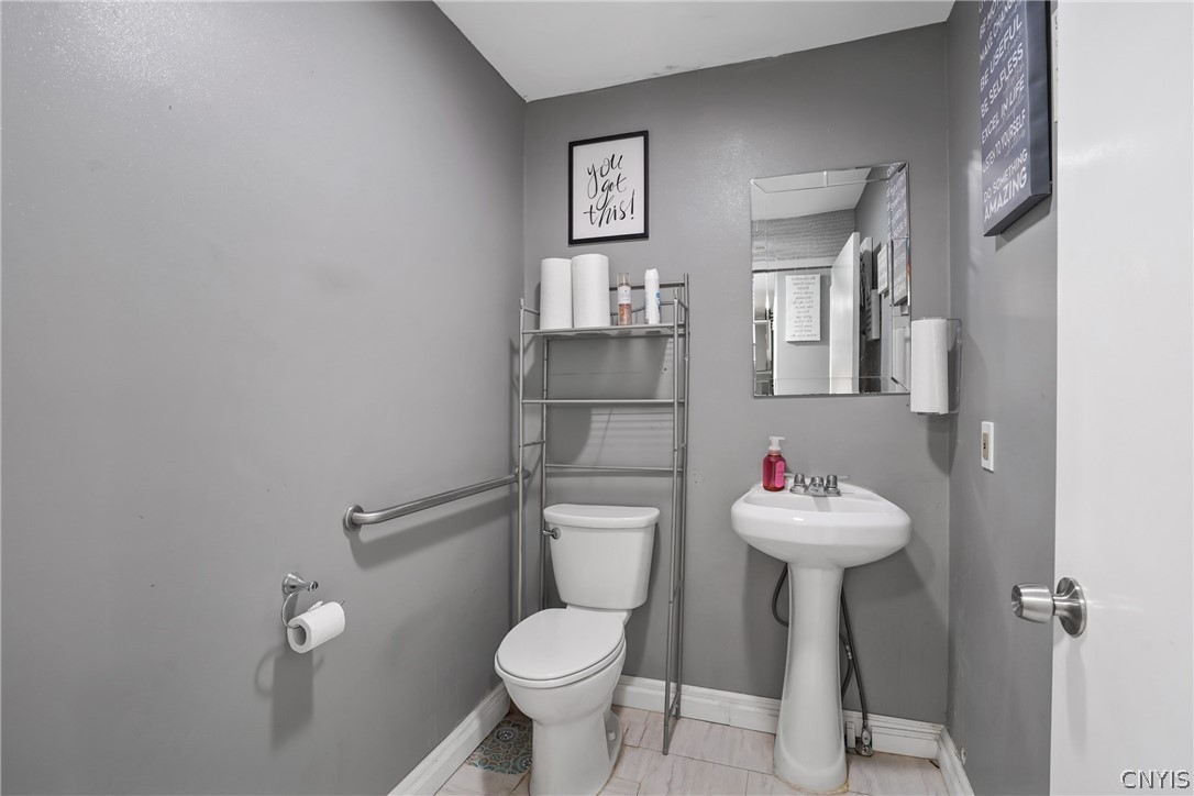 2 Mechanic Street Lysander, NY 13027 - Photo 8 of 28 At the end of the entry hallway is the half bathro