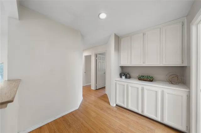 a hallway with wooden floor