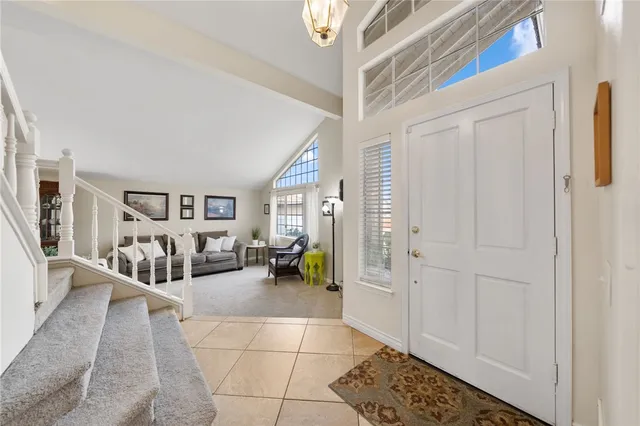 a view of an entryway with livingroom