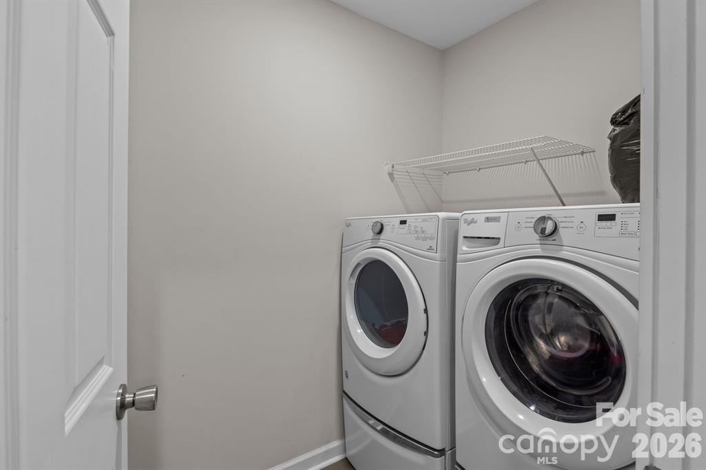 822 Lakehill Road Charlotte, NC 28214 - Photo 26 of 31 a utility room with dryer and washer