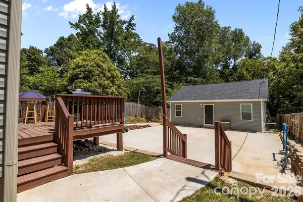 a view of a bench in the backyard