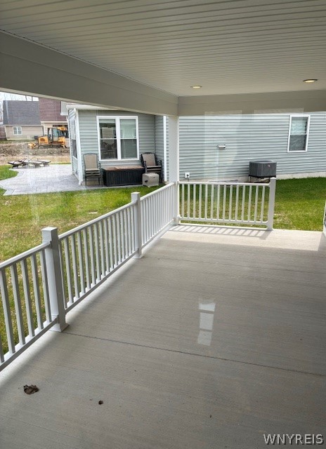 4543 Camp Road, Unit L97 Hamburg, NY 14075 - Photo 19 of 19 covered patio off the sunroom
