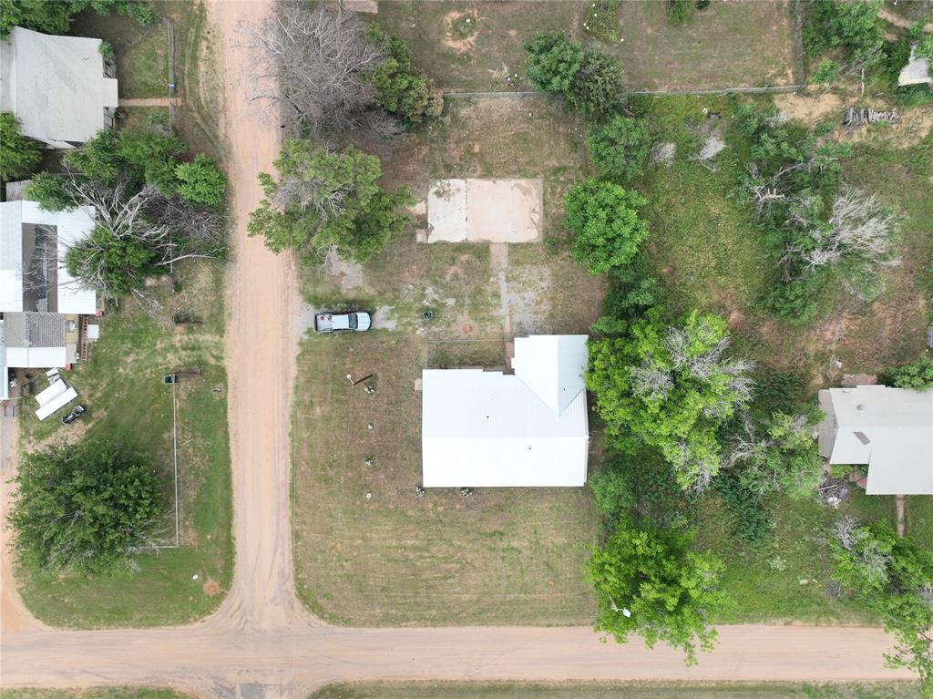 927 London Street Vernon, TX 76384 - Photo 9 of 20 an aerial view of a house with a yard and tree s
