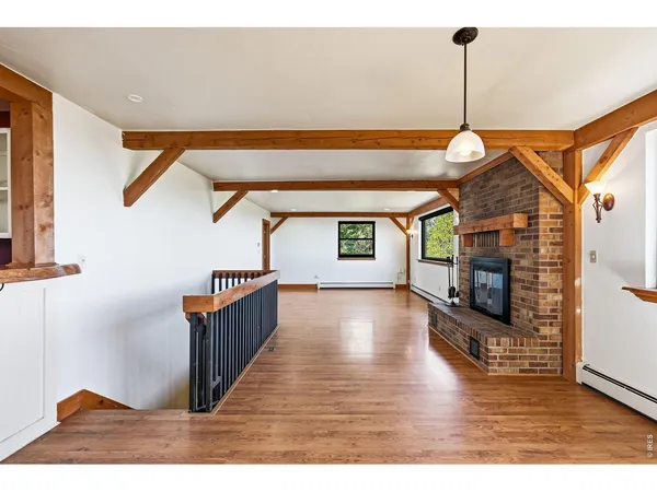 a living room with a fireplace