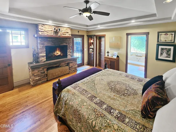 a large white kitchen with a large window