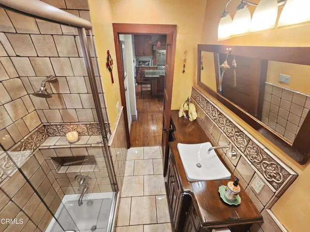 a view of a patio with couches and potted plants