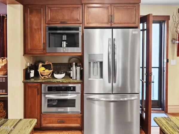 a spacious bathroom with a sink and a mirror