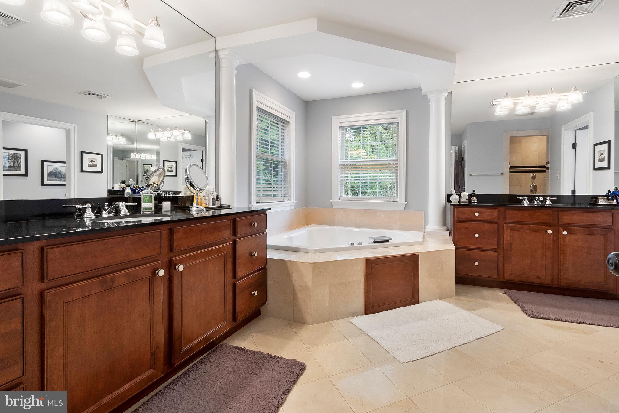718 North Valley Road Paoli, PA 19301 - Photo 22 of 44 Dual vanities and corner whirlpool tub