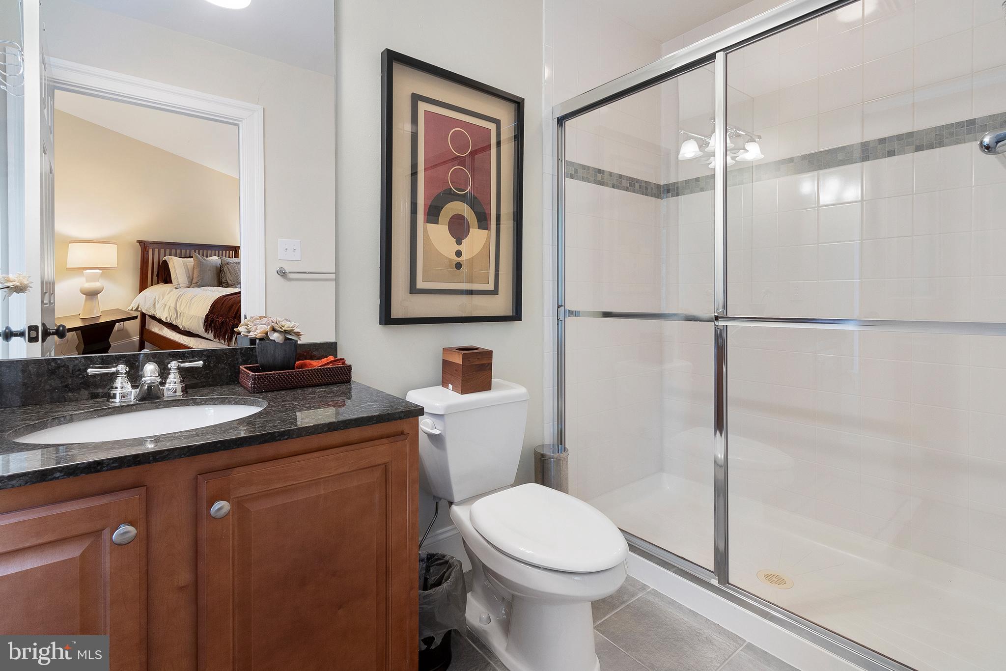 718 North Valley Road Paoli, PA 19301 - Photo 28 of 44 En suite Bath with clear glass tub enclosure