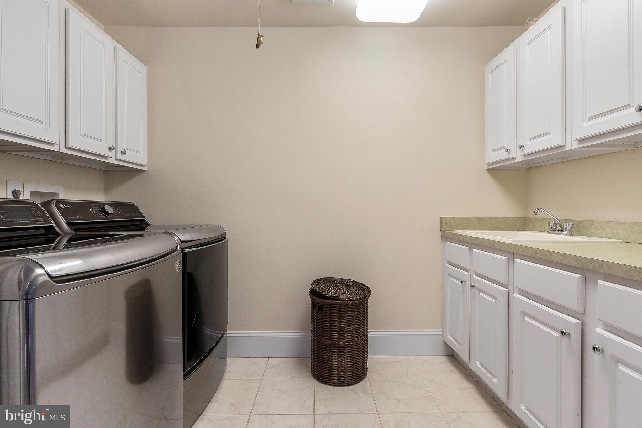 718 North Valley Road Paoli, PA 19301 - Photo 29 of 44 Convenient second floor Laundry with cabinetry
