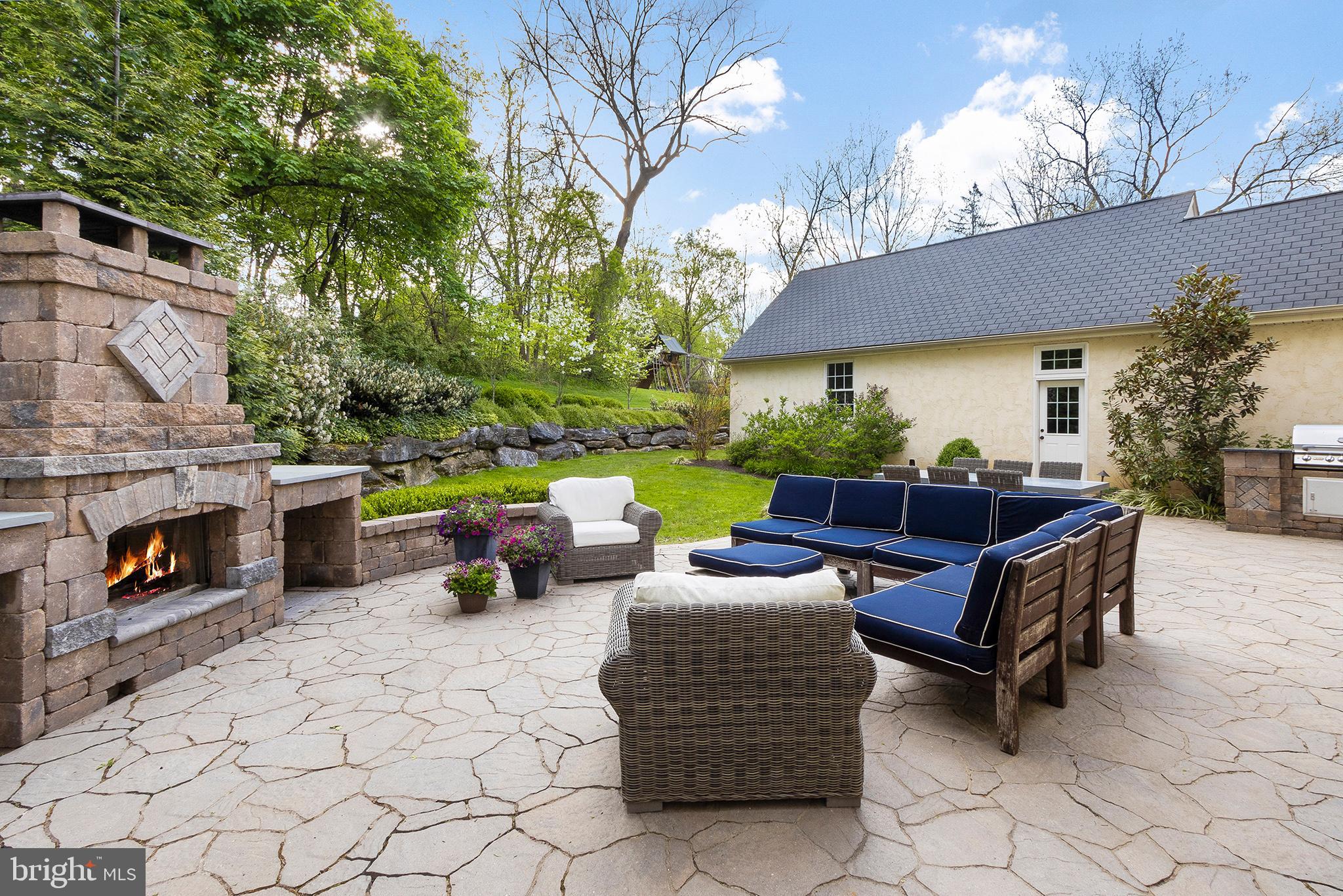 718 North Valley Road Paoli, PA 19301 - Photo 43 of 44 Stone Patio with Fireplace and built in grill