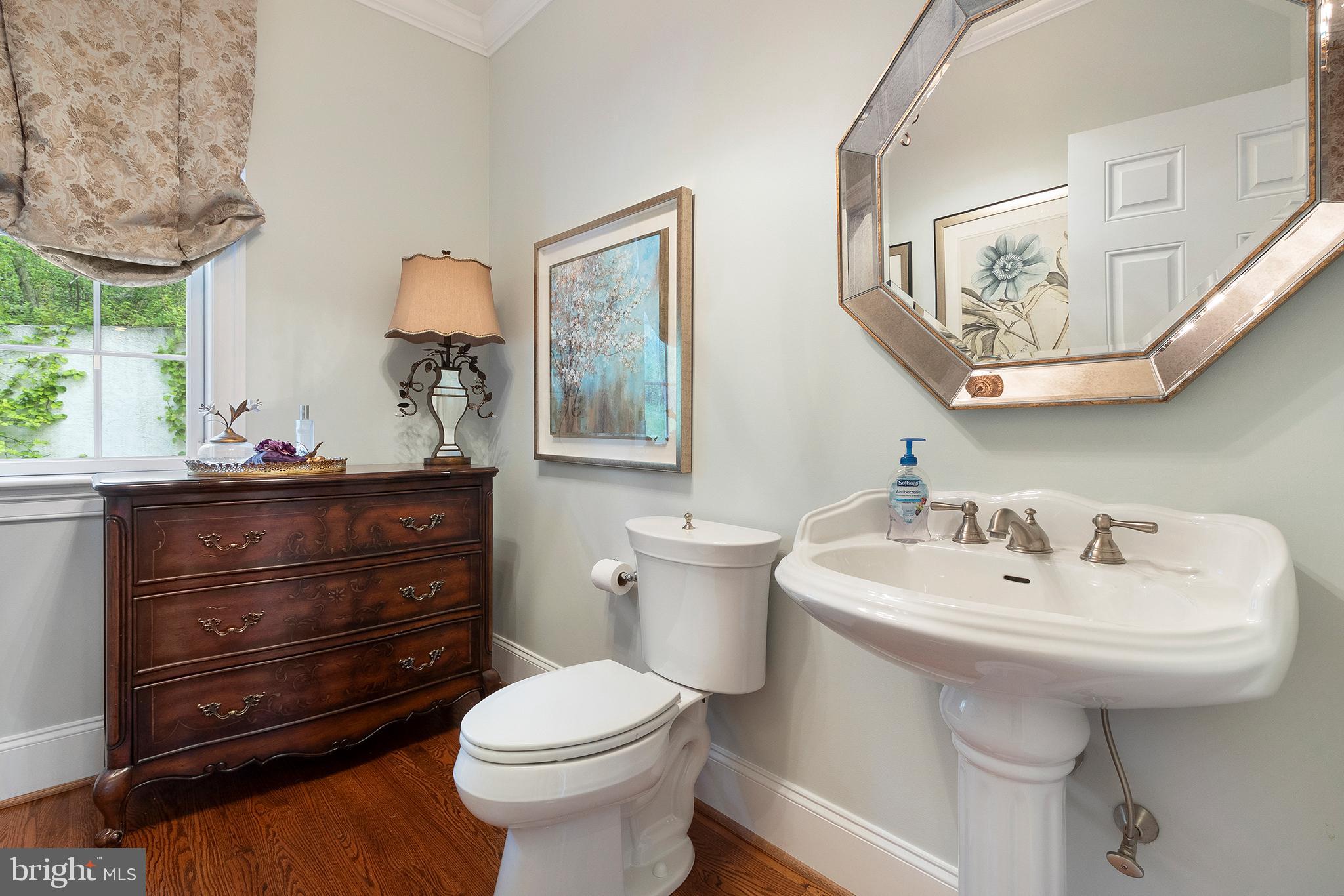718 North Valley Road Paoli, PA 19301 - Photo 8 of 44 Formal Powder Room with fluted pedestal sink