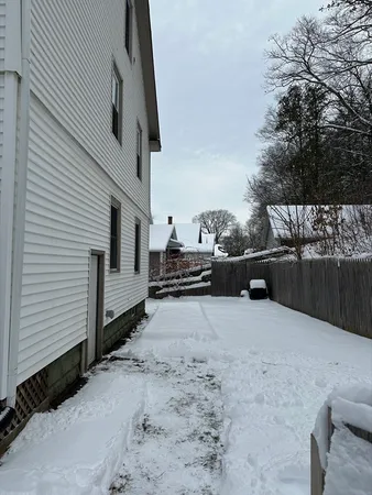a view of backyard of house