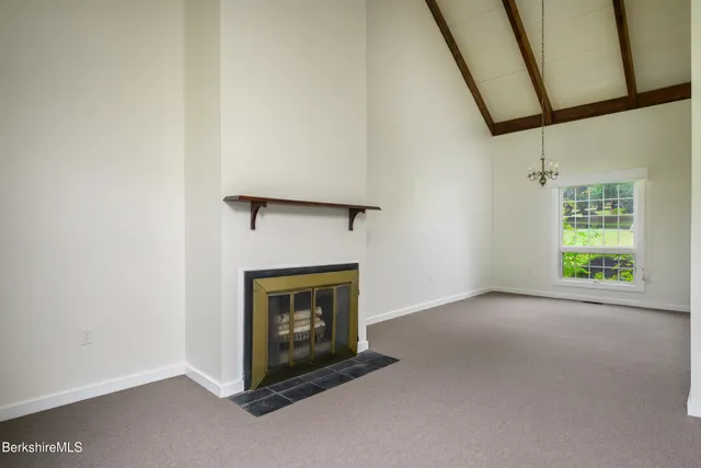 a living room with a fireplace