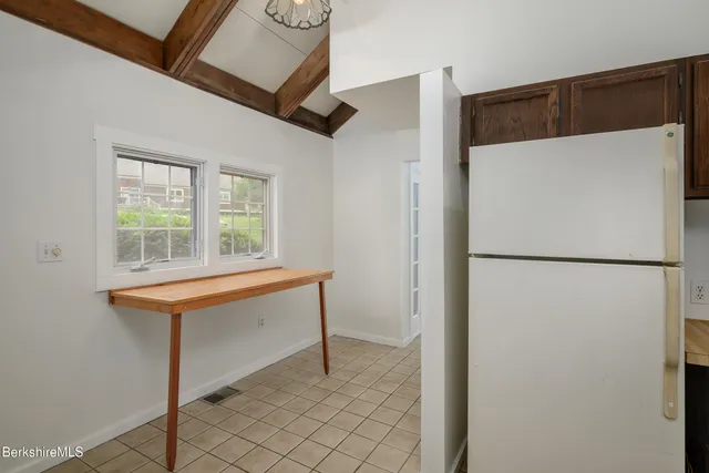 a view of walk in closet with window