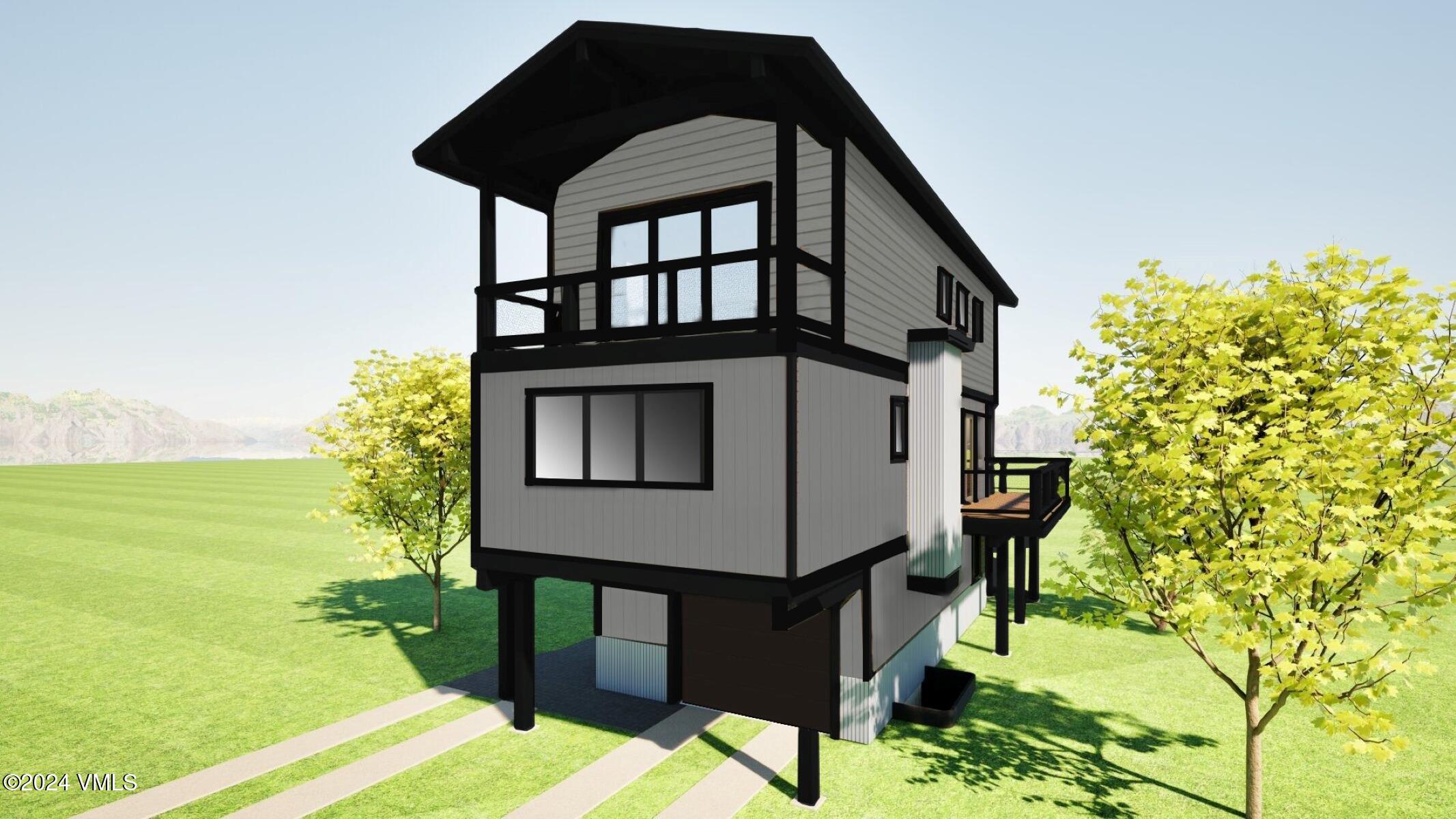 15 Belden Way Minturn, CO 81645 - Photo 2 of 5 a front view of a house with a yard