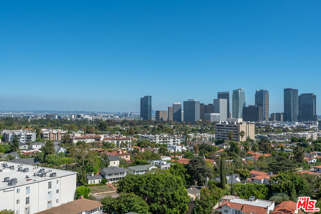 10490 Wilshire Boulevard, Unit 1206 Los Angeles, CA 90024 - Photo 15 of 44 a view of a city with tall buildings