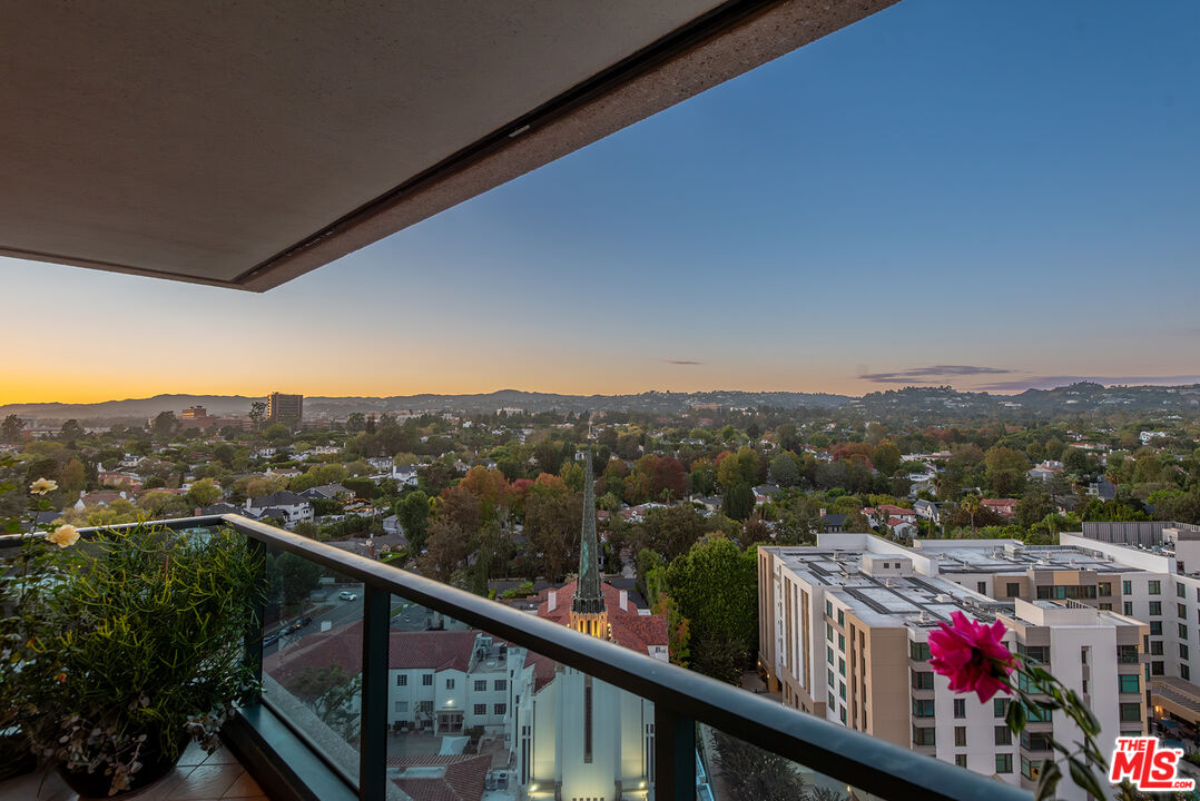 10490 Wilshire Boulevard, Unit 1206 Los Angeles, CA 90024 - Photo 9 of 44 a view of a city from a balcony