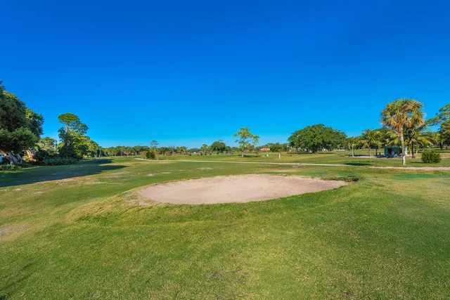 a view of a lake and yard