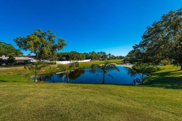 a front view of a house with swimming pool