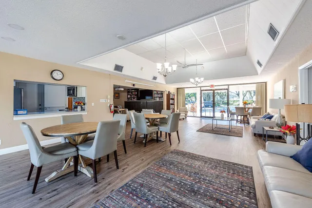 a view of a park with large trees