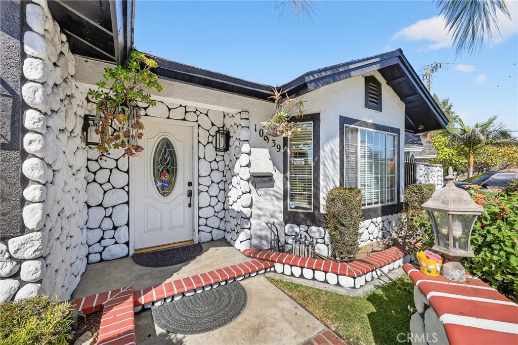 10939 Little Lake Road Downey, CA 90241 - Photo 3 of 55 a front view of a house with outdoor seating