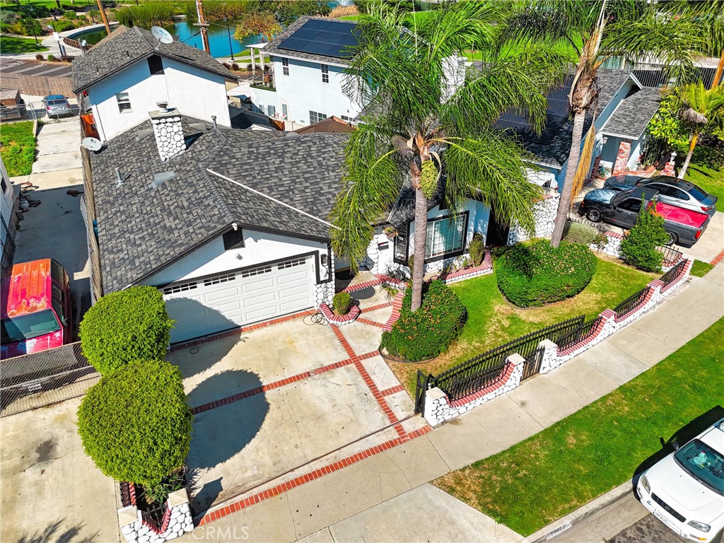 10939 Little Lake Road Downey, CA 90241 - Photo 52 of 55 an aerial view of a house with garden space and street view