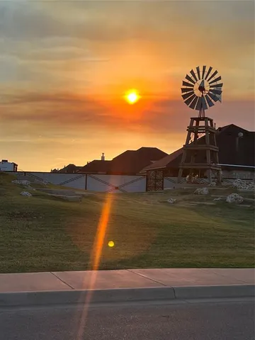 a view of a big yard next to a house