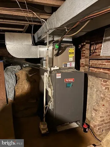 a view of a room with wooden walls