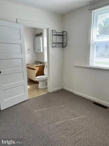 a bathroom with a sink and a shower