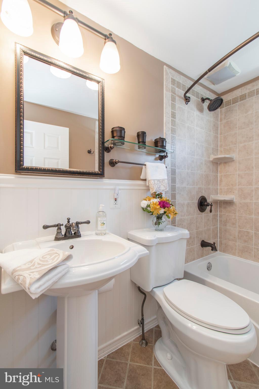 928 Kingsman Road Marcus Hook, PA 19061 - Photo 25 of 30 First floor updated bath with tiled tub area