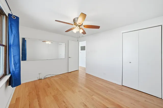 a view of a house with a sink and wooden fence