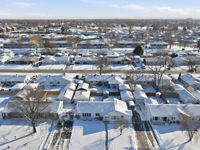 an aerial view of a city with lots of residential buildings