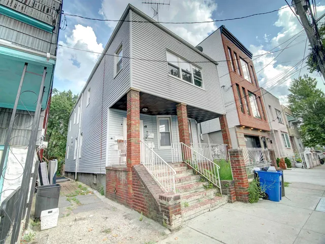 a view of a street with sitting area