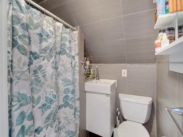 a bathroom with a sink and a toilet